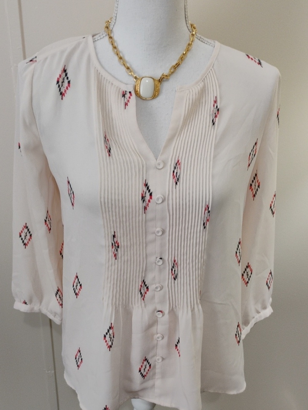 The Limited Cream Pintuck Button-Front Blouse with Pink & Black Diamond Motif